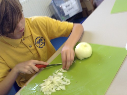 Try not to cry when chopping your onion Arran. We learnt the bridging technique when chopping our vegetables .