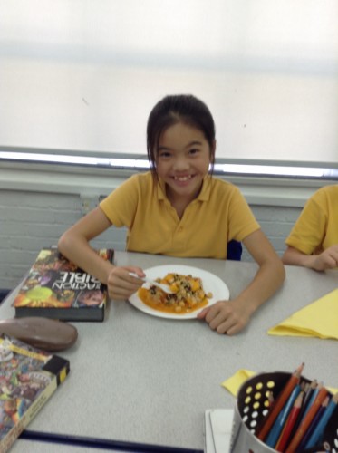 Vivian looks happy with her cooking skills. Watch out Jamie Oliver!