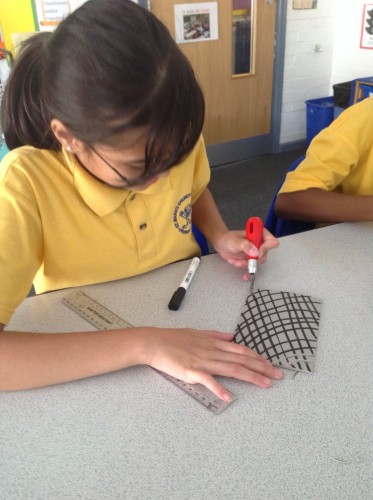 Next we used a carving tool to carve our designs out of the Lino. This was very tricky and required lots of concentration.