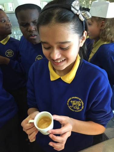 Mufsy isn't sure about her Espresso. Very posh Mufsy!